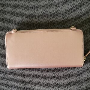 NWOT Rose Gold Clutch Wallet with loops for potential Crossbody